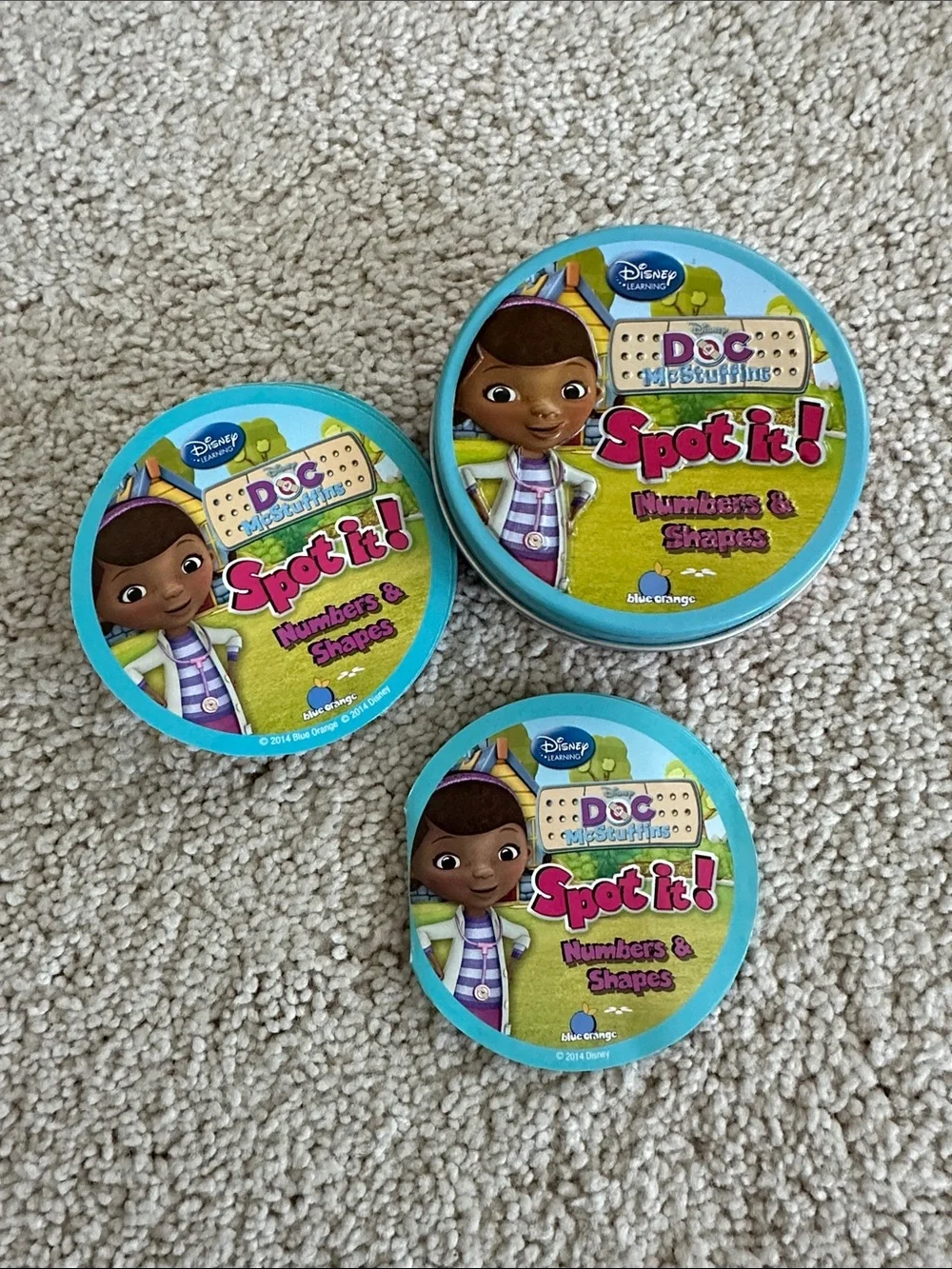 Disney Doc McStuffins Spot It! Numbers & Shapes Game - Blue and Green